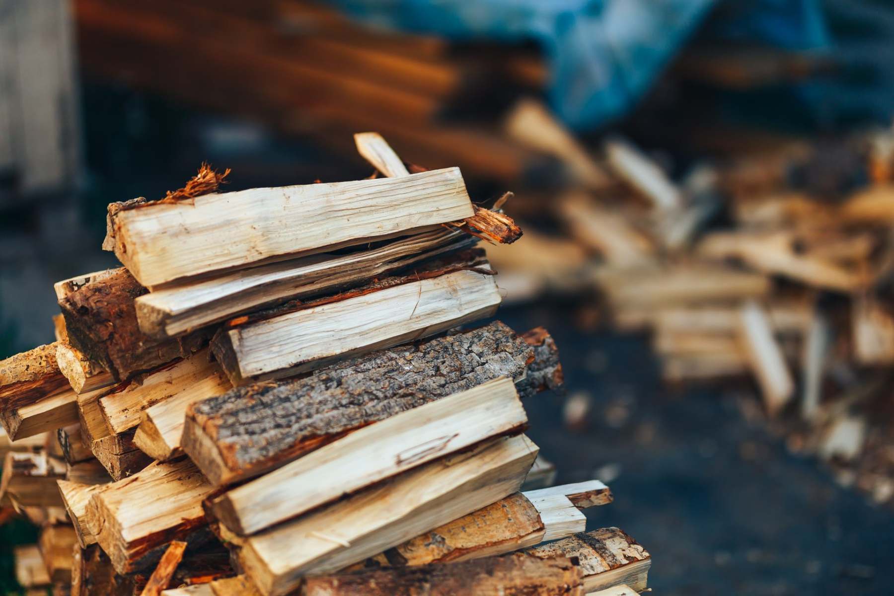 a-pile-of-stacked-firewood-prepared-for-heating-t-2023-11-27-05-12-51-utc